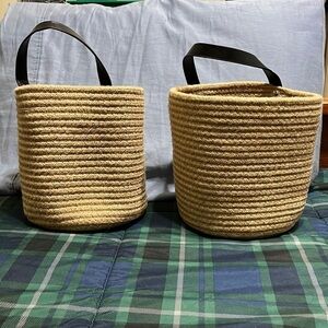 Set of two woven baskets. Handle on one side. 8 inches tall. New